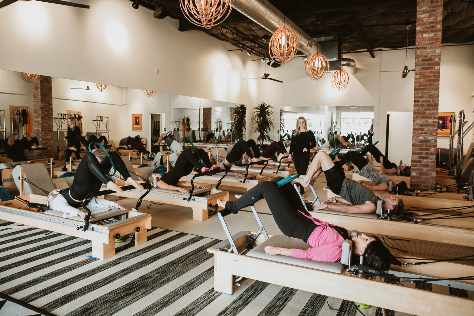 A full reformer class in the studio